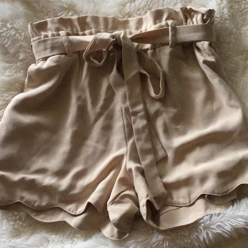 Tan Pair of shorts